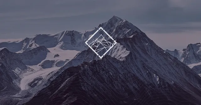 Snow-covered mountain ridge with a white diamond-shaped Carpathian Stake emblem
